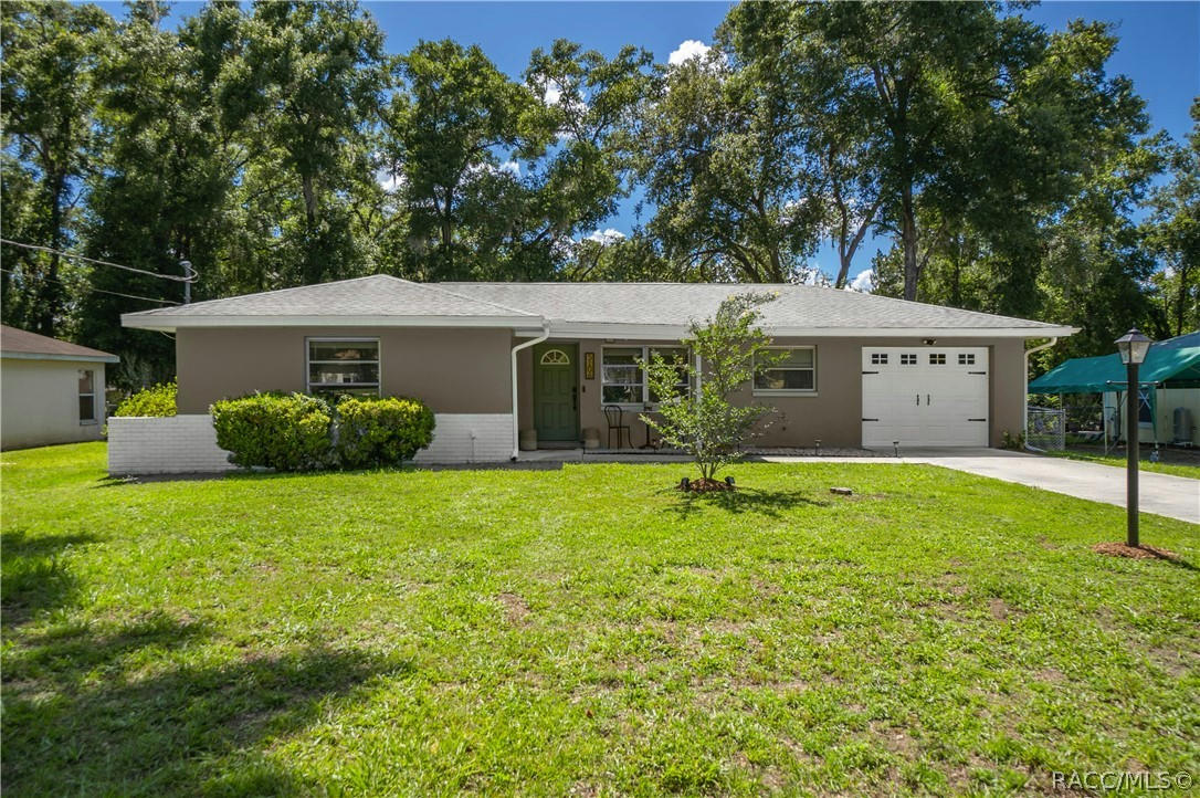 5106 S SWALLOW AVE, INVERNESS, FL 34452, photo 1 of 32